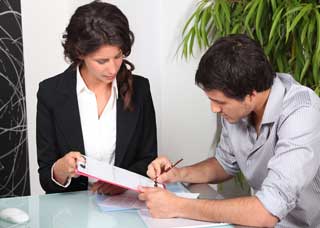 Woman having a man sign a contract
